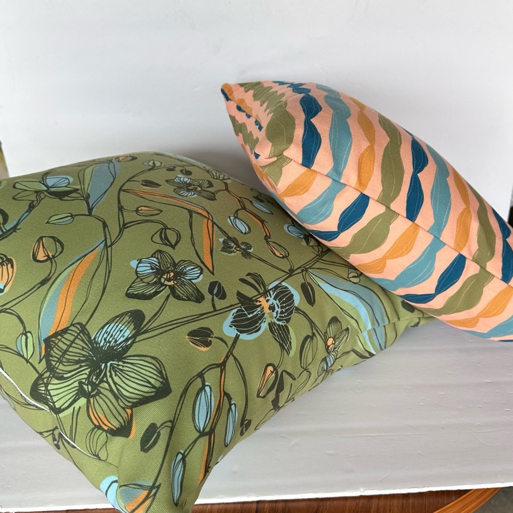 Set of 2 accent throw pillows made with outdoor fade-resistant fabric.